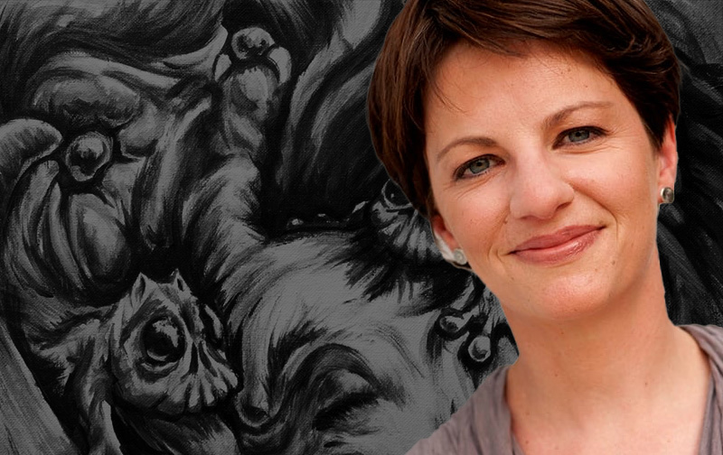 Amanda Riley in front of a black-and-white background depicting fearful imagery