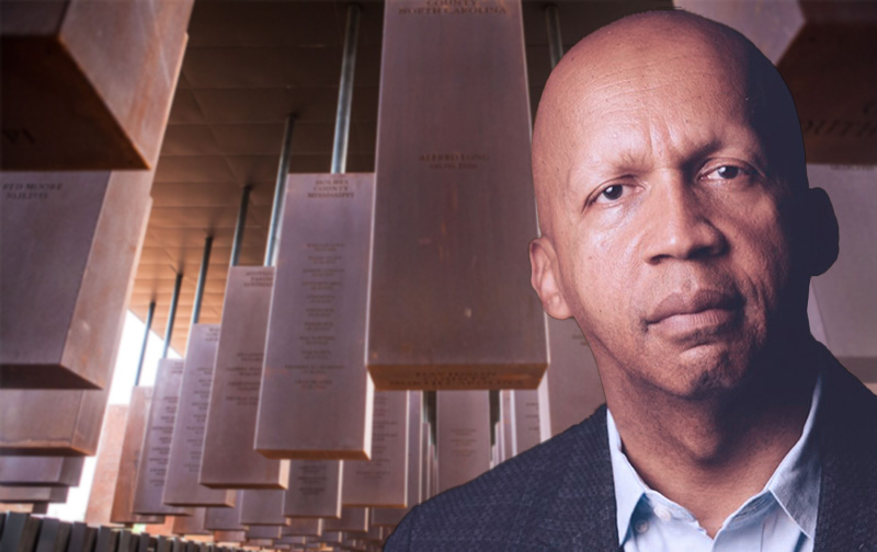 Bryan Stevenson in front of a view of the National Memorial for Peace and Justice
